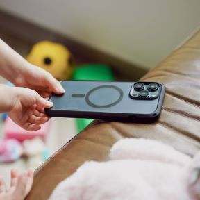 Catalyst-iPhone-15-pro-max-protective-stylish-drop-proof-iphone-cases-child-grabbing-phone-from-sofa.jpg