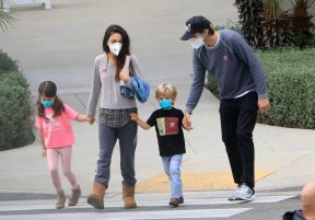 EXCLUSIVE Mila Kunis and Ashton Kutcher Head Out as a Family to Vote in Los Angeles.jpg