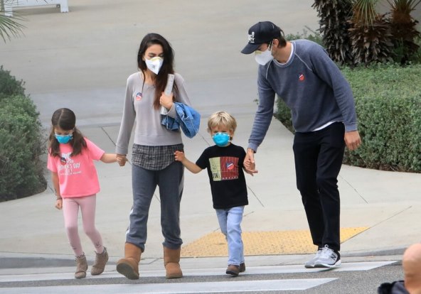EXCLUSIVE Mila Kunis and Ashton Kutcher Head Out as a Family to Vote in Los Angeles.jpg
