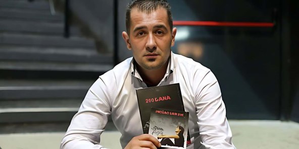 Marijan Gubina with the book 260 DAYS.jpg