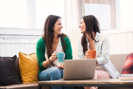 Women chatting while enjoying a cup of coffee (1) (1).jpg