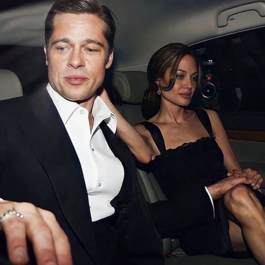 Brad Pitt i Angelina Jolie u taksiju