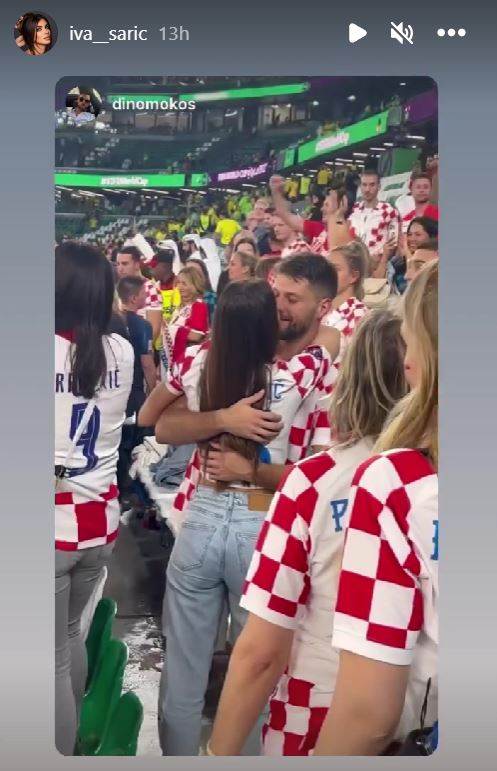Iva Šarić i Bruno Petković razmjenjuju nježnosti na tribinama nakon pobjede Hrvatske