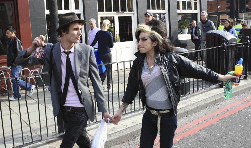Amy Winehouse and Blake Fielder-Civil Out and About, London, UK.jpeg