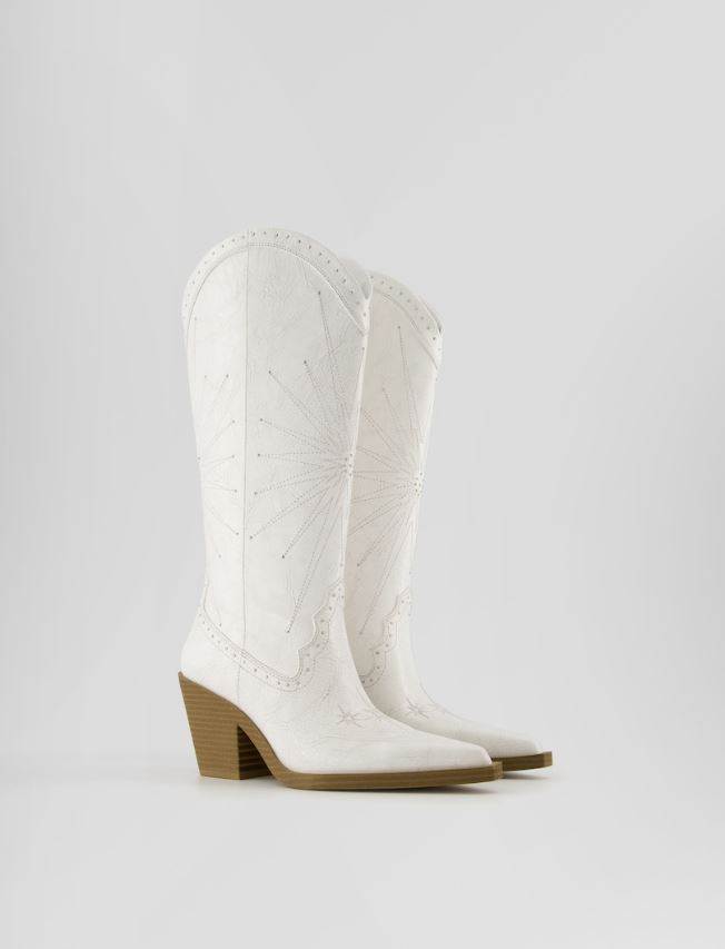 Kaubojske čizme s visokom potpeticom i zakovicama/ Bershka/ 59,99 EUR